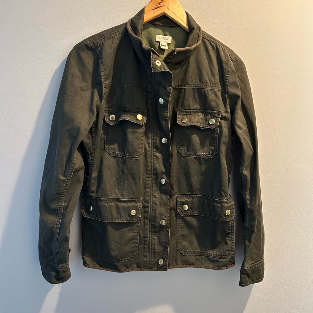 - Women’s J Crew army green colored jacket size Medium.